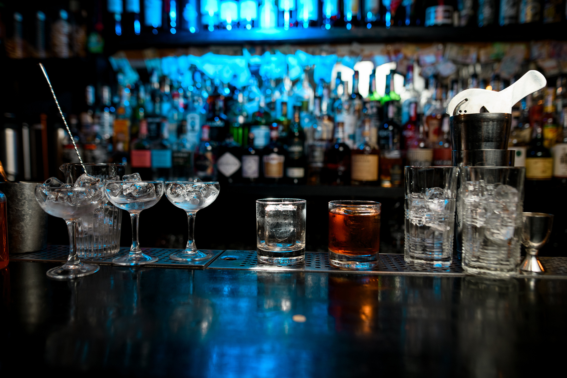 Different bar equipment stand on bar counter